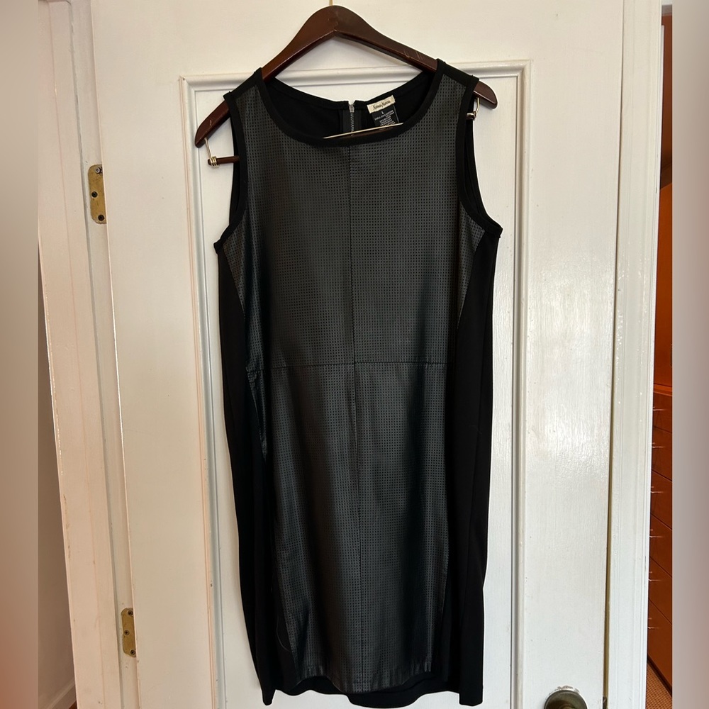 Neiman Marcus leather dress.  Perfect never worn. Size L fits 10-12.